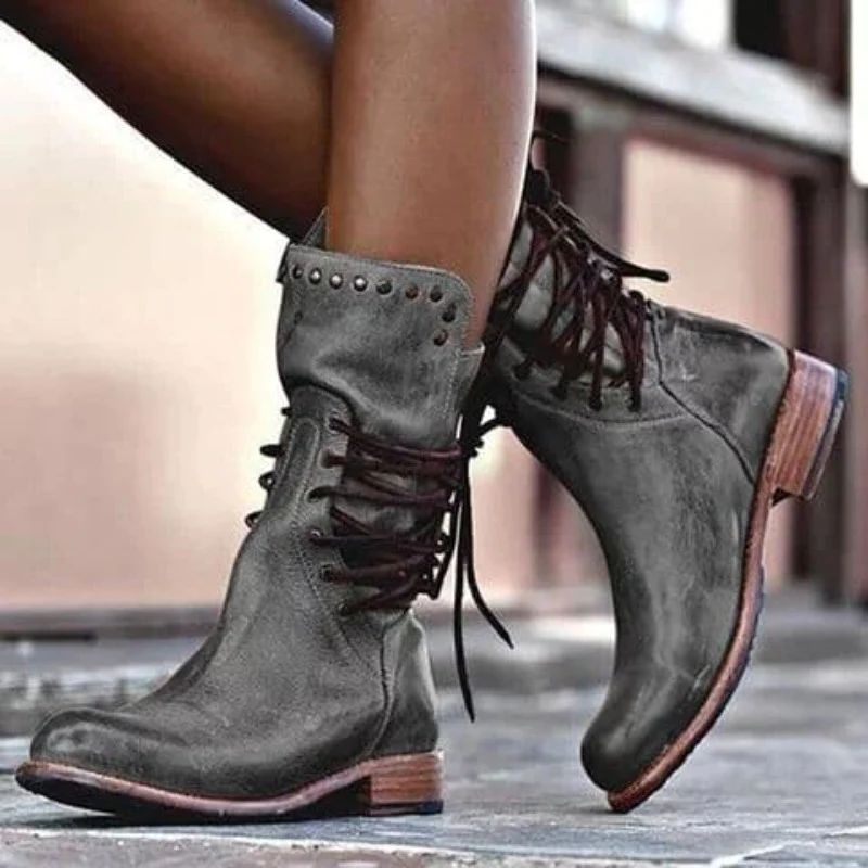 Women's classic comfort boots in neutral tones, cushioned ankle silhouette with timeless everyday style