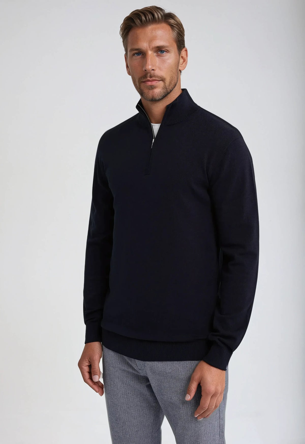 Men's navy quarter-zip knit sweater with classic fit and ribbed collar for sophisticated layering