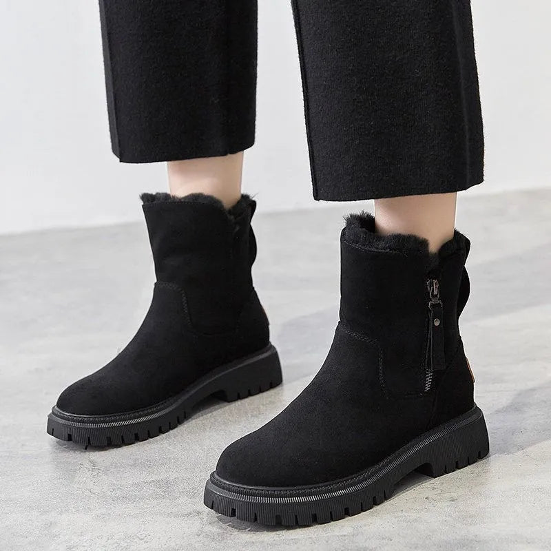 Kai™ black winter boots sleek ankle-to-mid-calf cut with plush insulation for cold weather
