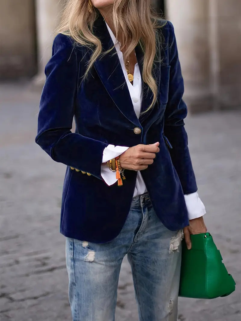 Elegant black velvet blazer with shimmering sheen and figure-flattering feminine cut