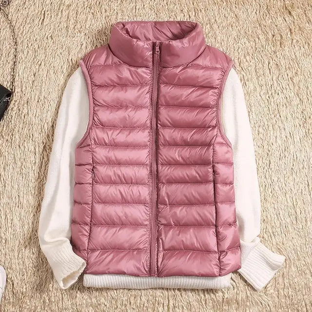 Women's quilted down vest lightweight insulated high collar zipper closure everyday warmth