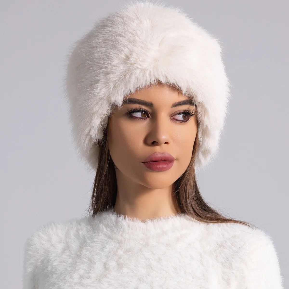 Women's solid furry round fur hat with full coverage silhouette for elegant winter style