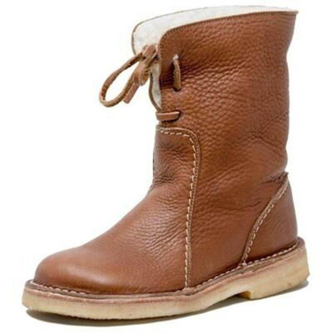 Black insulating waterproof boots with heat-retaining interior for all-day warmth and weather protection