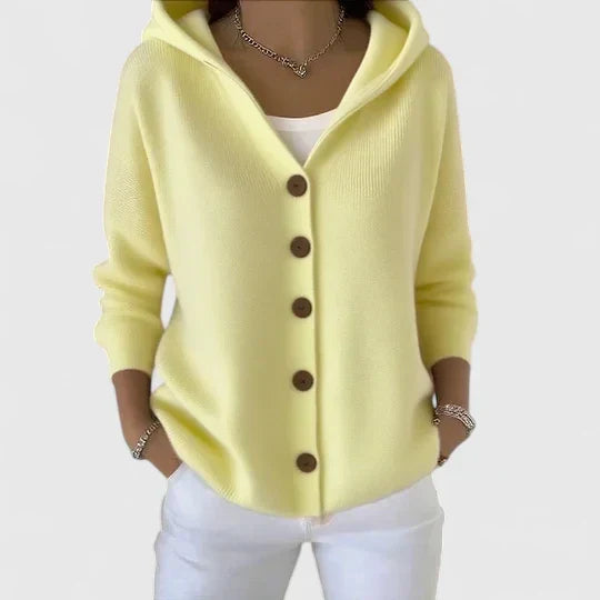 Elegant cream knit cardigan with flattering drape and refined lightweight layering design