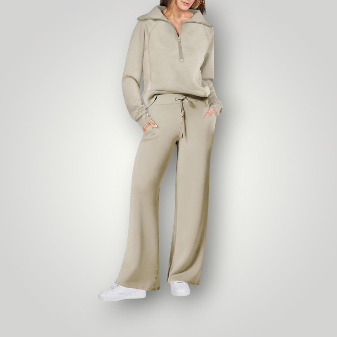 Women's gray loungewear set half-zip sweatshirt and wide-leg sweatpants matching two-piece cozy neutral