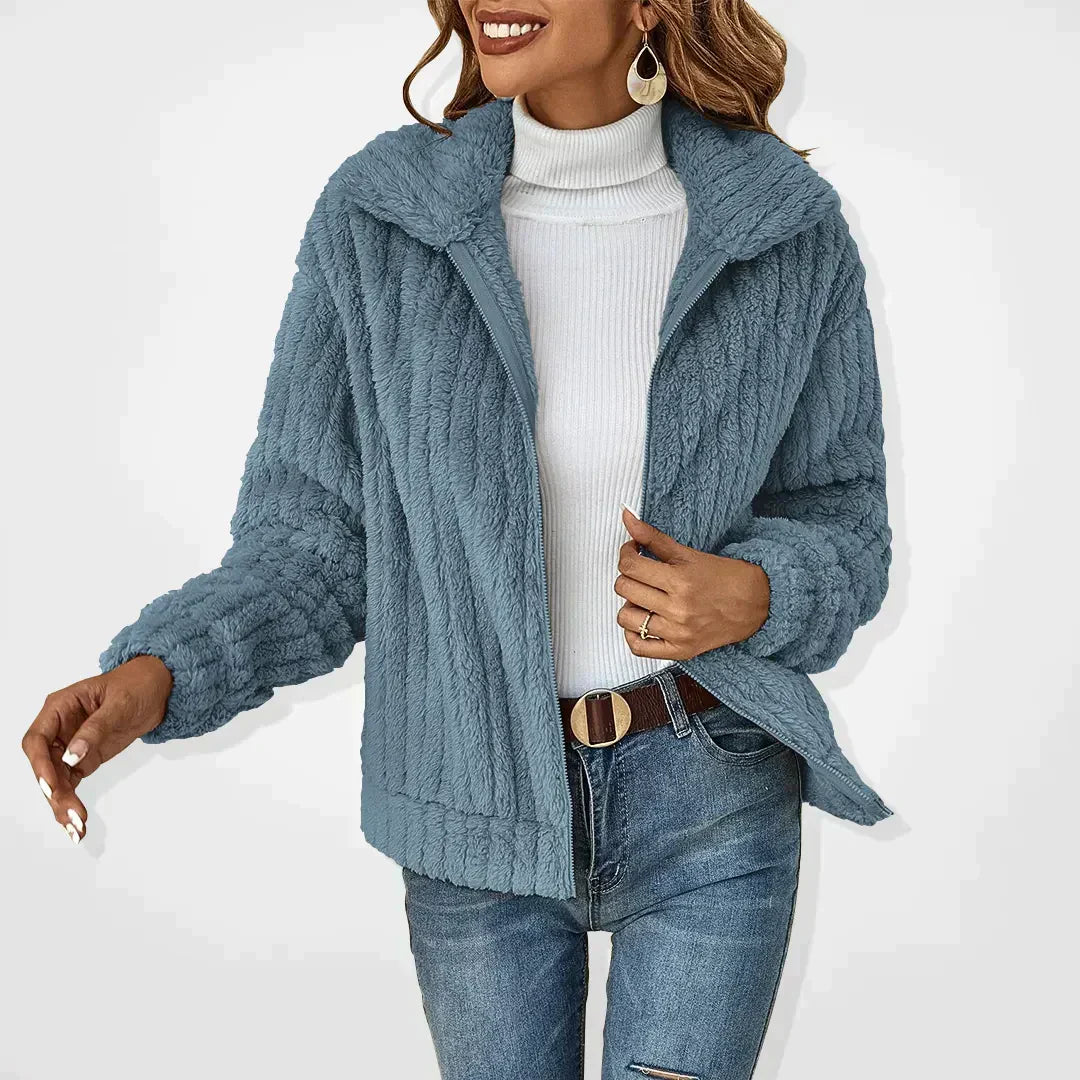 Relaxed-fit casual cardigan in soft neutral tone with draped silhouette and versatile everyday style