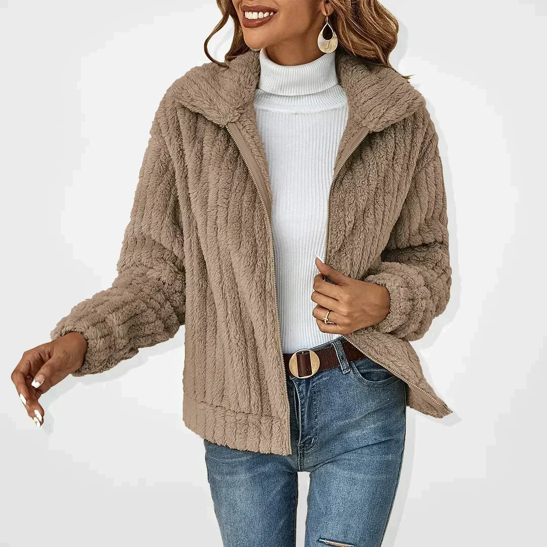 Relaxed-fit casual cardigan in soft neutral tones with a cozy drape and versatile everyday style