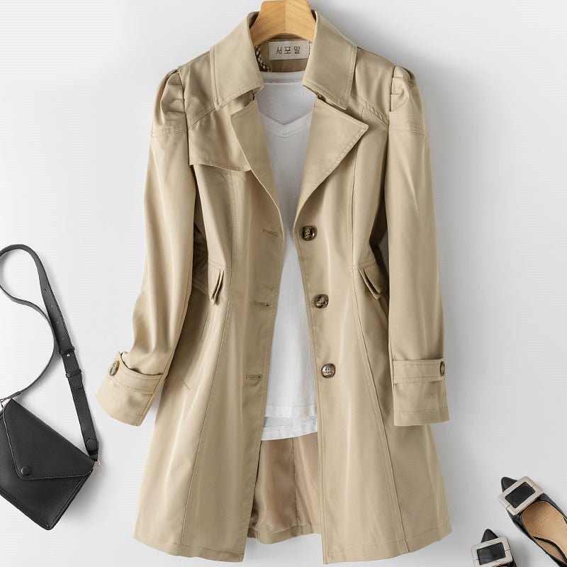 Women's beige lightweight trench coat classic mid-length cut with double-breasted button closure