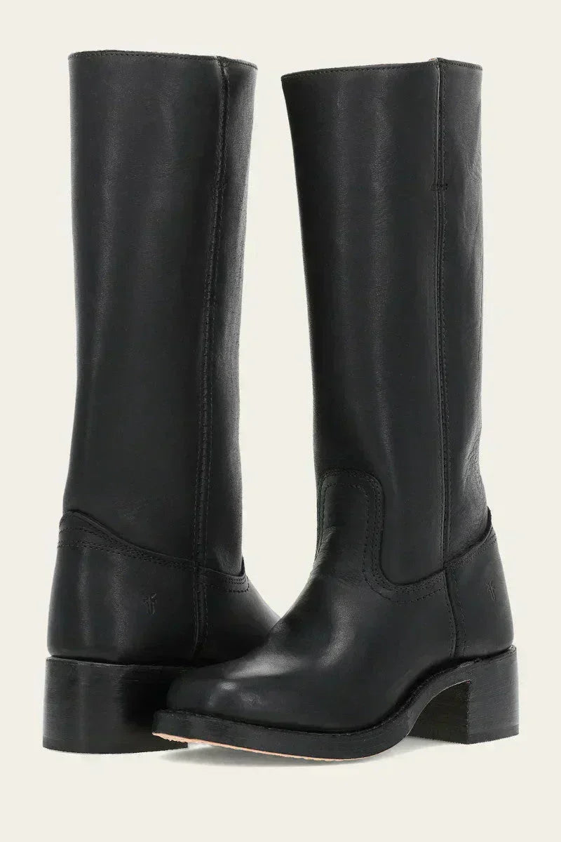 Black knee-high boots slim fit silhouette with structured sole for a polished modern look