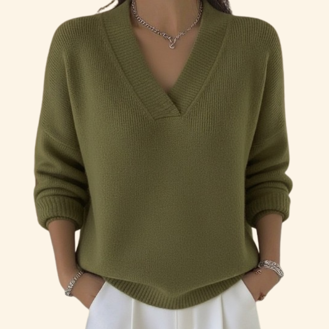 Relaxed V-neck knit sweater in soft neutral tone with lightweight breathable fabric and flattering loose silhouette