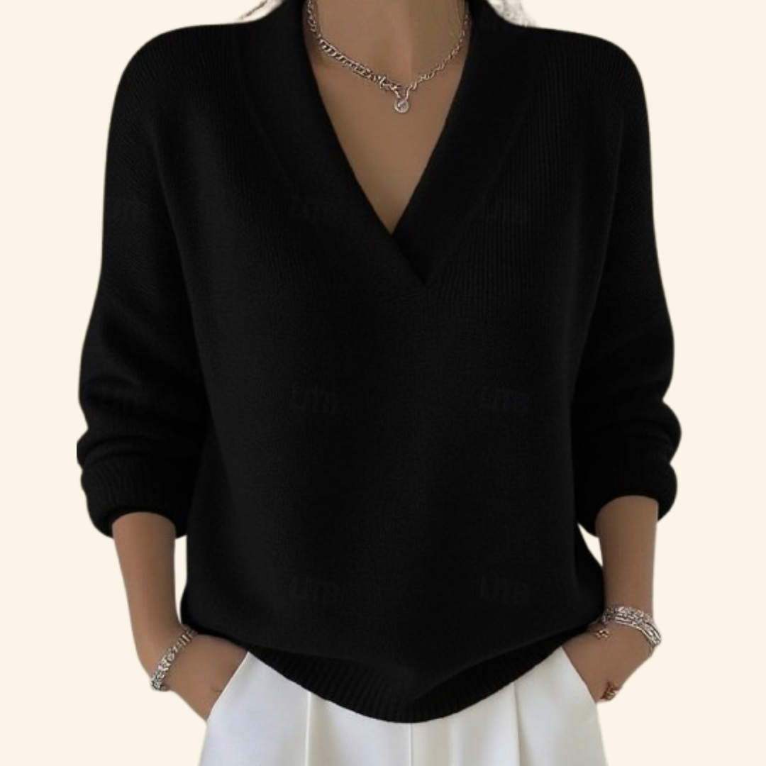 Relaxed V-neck knit sweater in soft neutral tones with lightweight breathable fabric and flattering loose silhouette