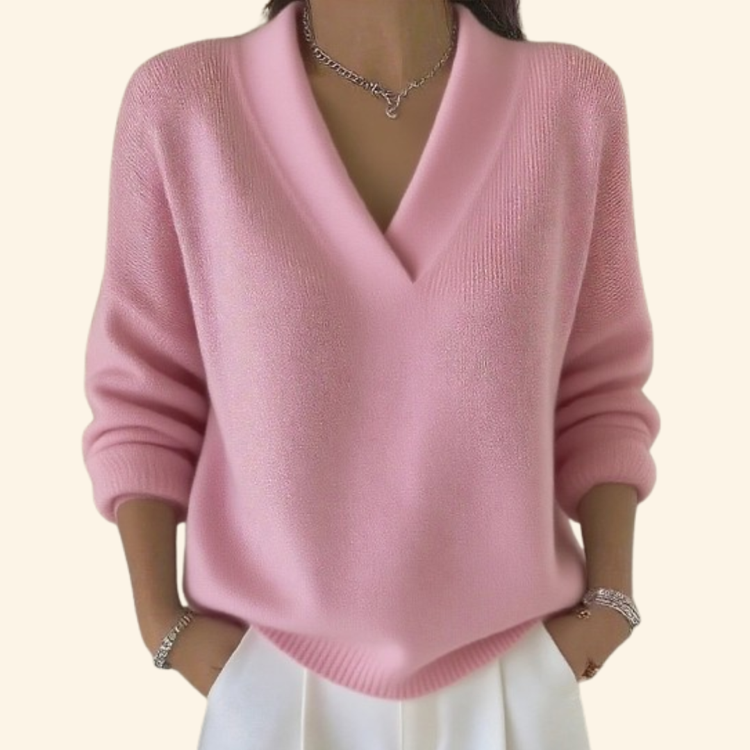 Relaxed V-neck knit sweater in soft neutral tones with lightweight breathable fabric and flattering loose fit