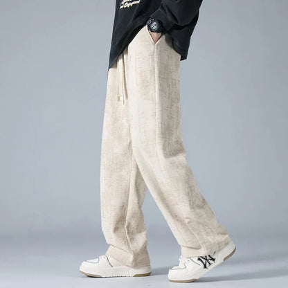 Azure blue corduroy sweatpants with relaxed wide-leg fit and utility pockets