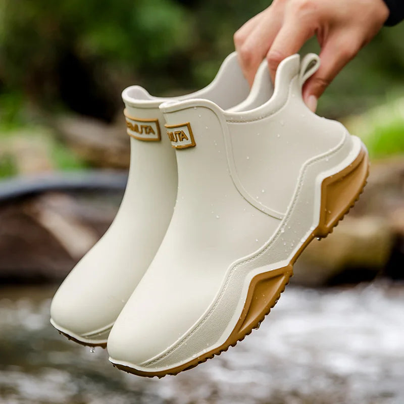 Women's waterproof slip-on outdoor boots in neutral tone with easy pull-on design