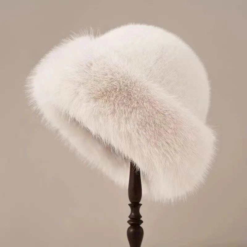 Women's plush fur hat rounded silhouette with furry trim, cozy winter accessory