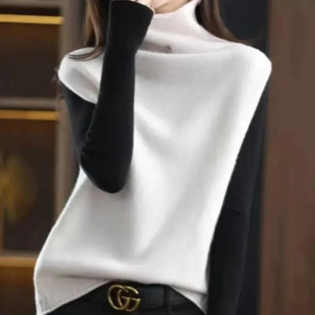 Ivory wool turtleneck vest sleeveless slim-fit layering piece with high polished neck in premium soft knit