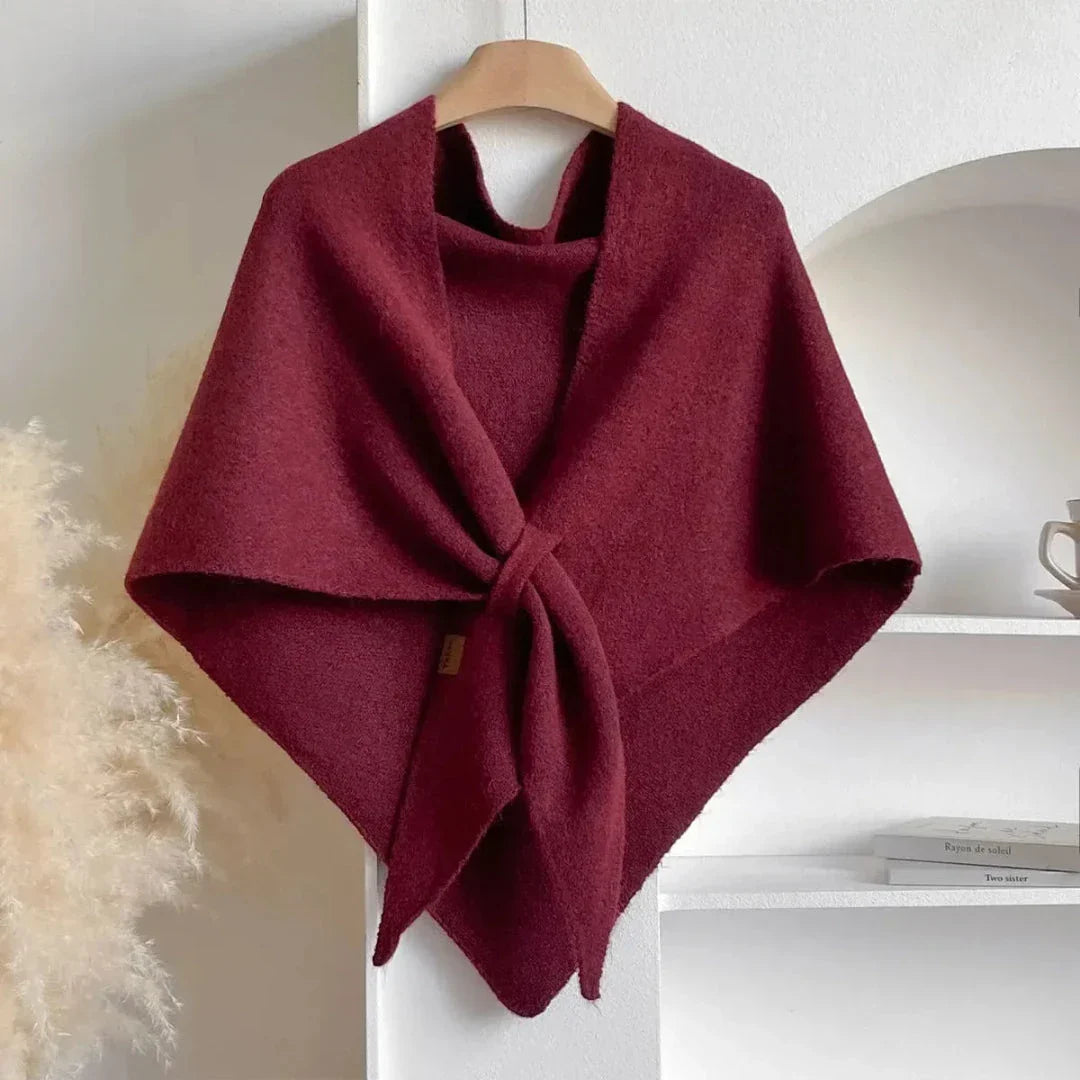 Soft knit shawl in neutral tone with tie-front design and elegant draped silhouette