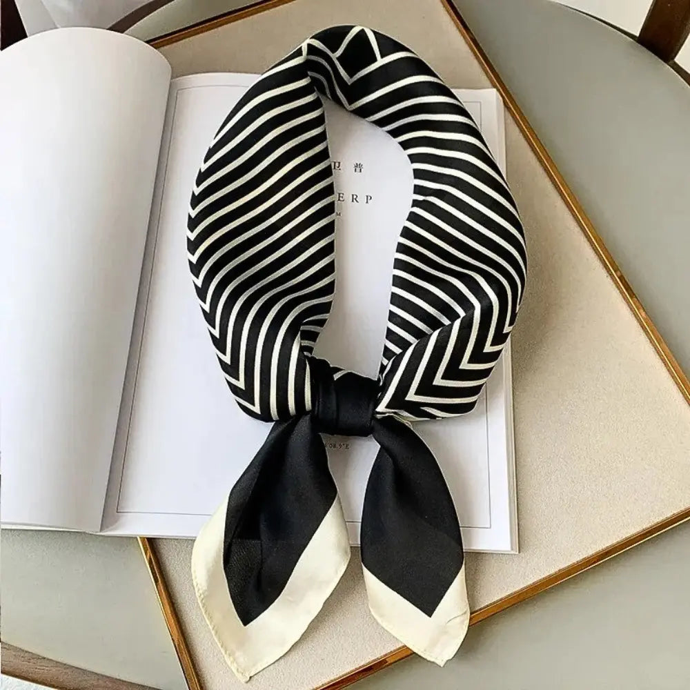 Orsenvi Celeste lightweight silk scarf in versatile styles for neck, headband, or bag with natural sheen