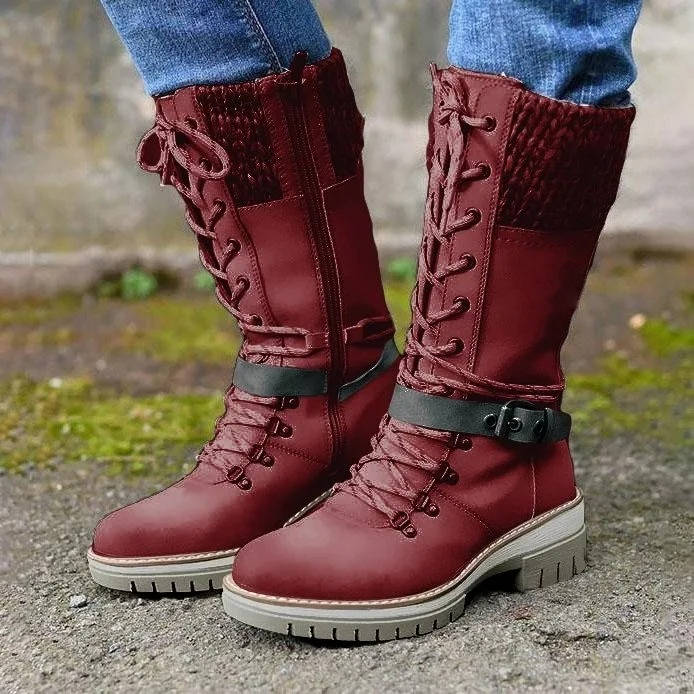 Women's waterproof snow boots in classic black PU leather with vintage-inspired silhouette and cold-weather grip sole