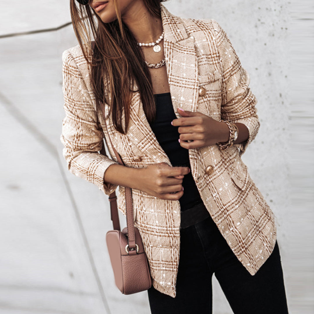 Women's black white checkered blazer with feminine tailored cut and modern structured silhouette