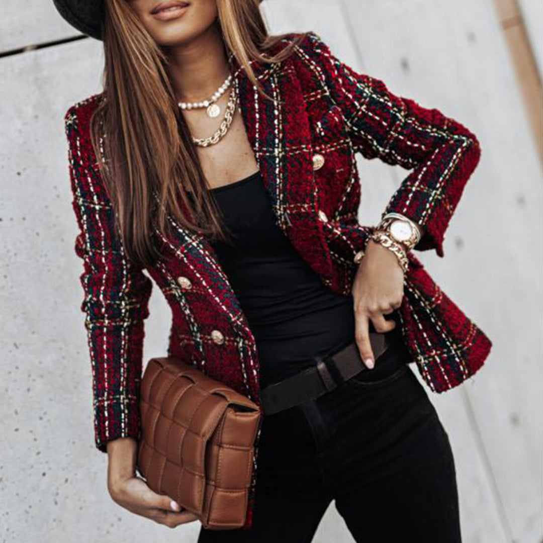 Women's black white checkered blazer with feminine tailored cut and modern structured silhouette