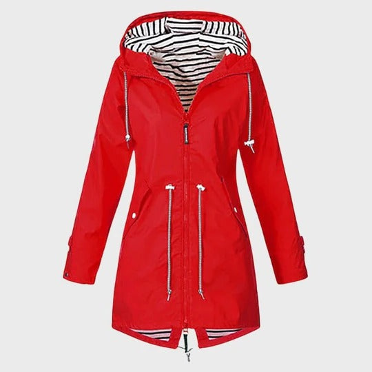 Women's long waterproof hooded rain jacket with extended coverage for all-weather protection