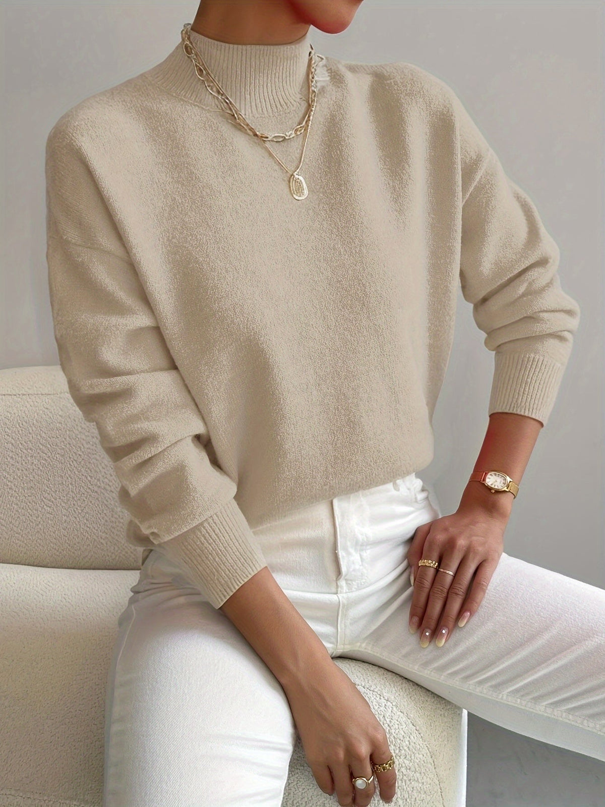 Elegant women's turtleneck sweater in classic style with slim flattering fit and refined neckline
