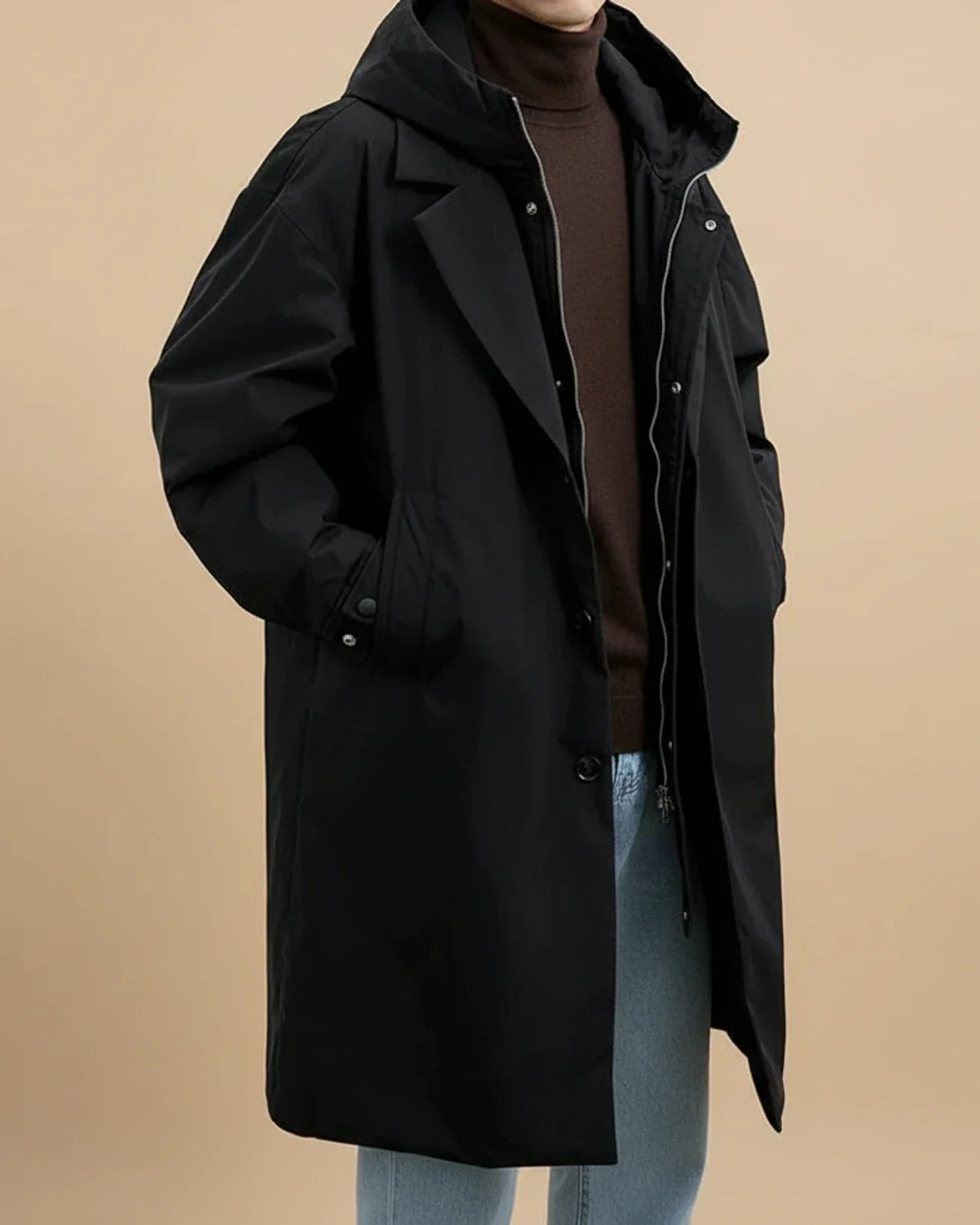 Men's olive long waterproof hooded overcoat with oversized fit and zip or button front closure
