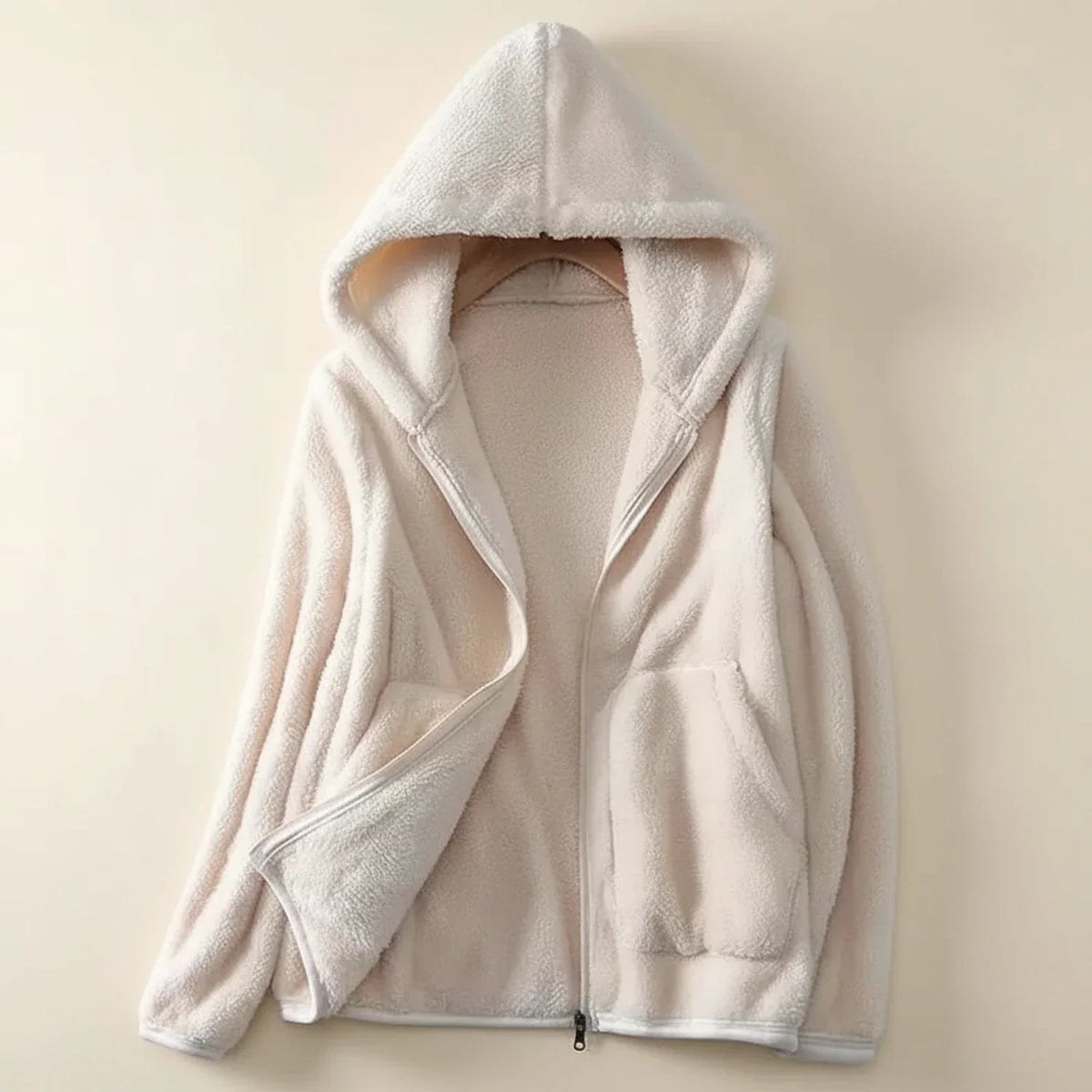 Women's relaxed fit hooded fleece zip-up jacket with patch pockets for everyday layering